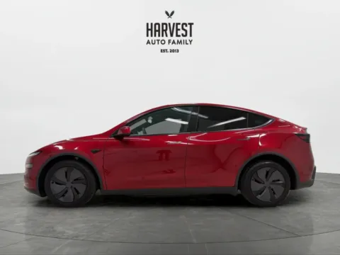 Photos of 2026 Tesla Model Y Standard Sport Utility 4D for sale in Wahoo, NE at Harvest Auto Family