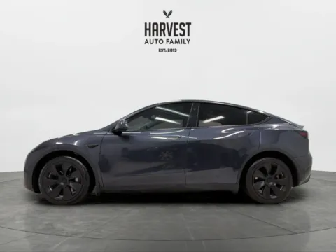 Photos of 2024 Tesla Model Y Long Range Sport Utility 4D for sale in Wahoo, NE at Harvest Auto Family