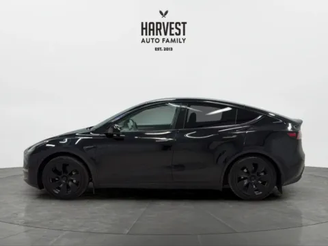 Photos of 2023 Tesla Model Y Long Range Sport Utility 4D for sale in Wahoo, NE at Harvest Auto Family