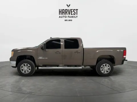 Photos of 2007 GMC Sierra 2500 HD Crew Cab SLT Pickup 4D 6 1/2 ft for sale in Wahoo, NE at Harvest Auto Family