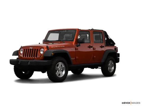Orange 2009 Jeep Wrangler Unlimited X for sale in Statesboro, GA