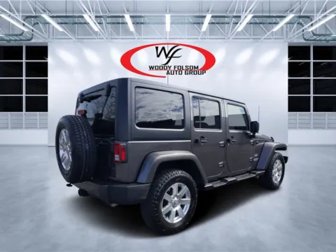 Another view of 2016 Jeep Wrangler Unlimited Sahara for sale in Douglas, GA at Woody Folsom CDJR of Douglas