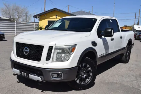 Photos of 2016 Nissan TITAN XD Crew Cab PRO-4X Pickup 4D 6 1/2 ft for sale in El Paso, TX at Select Automotive Inc.