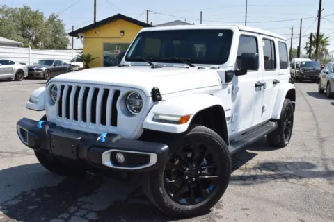 Photos of 2022 Jeep Wrangler Unlimited 4xe Sahara 4xe Sport Utility 4D for sale in El Paso, TX at Select Automotive Inc.