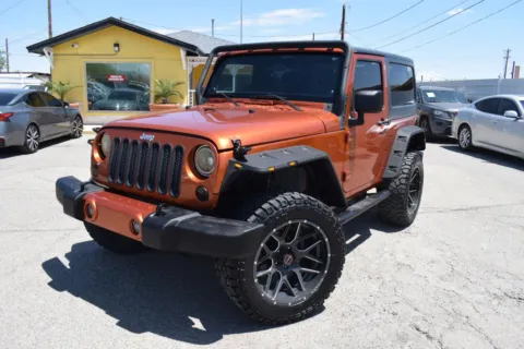 Orange 2011 Jeep Wrangler Sport SUV 2D for sale in El Paso, TX