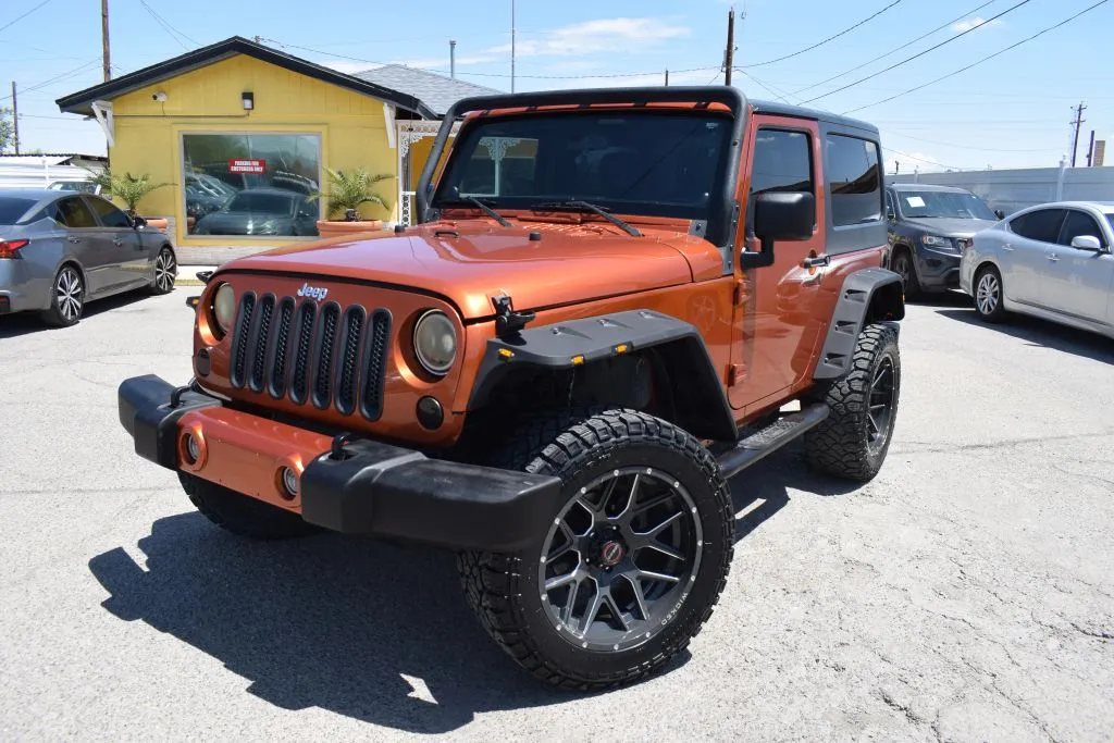 Orange 2011 Jeep Wrangler Sport SUV 2D for sale in El Paso, TX