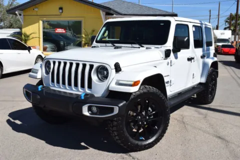Photos of 2022 Jeep Wrangler Unlimited 4xe Sahara 4xe Sport Utility 4D for sale in El Paso, TX at Select Automotive Inc.