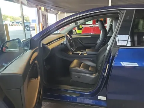 Another view of 2023 Tesla Model Y Long Range for sale in Miramar, FL at Auto Trust USA