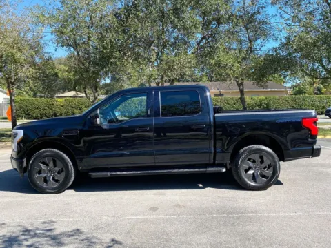 More photos of 2022 Ford F-150 Lightning LARIAT at Auto Trust USA, FL
