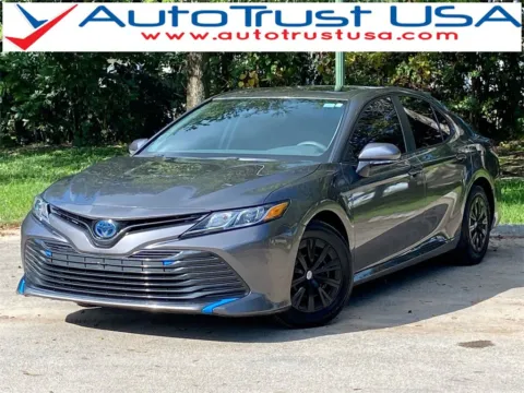Red 2019 Toyota Camry Hybrid LE for sale in Miramar, FL