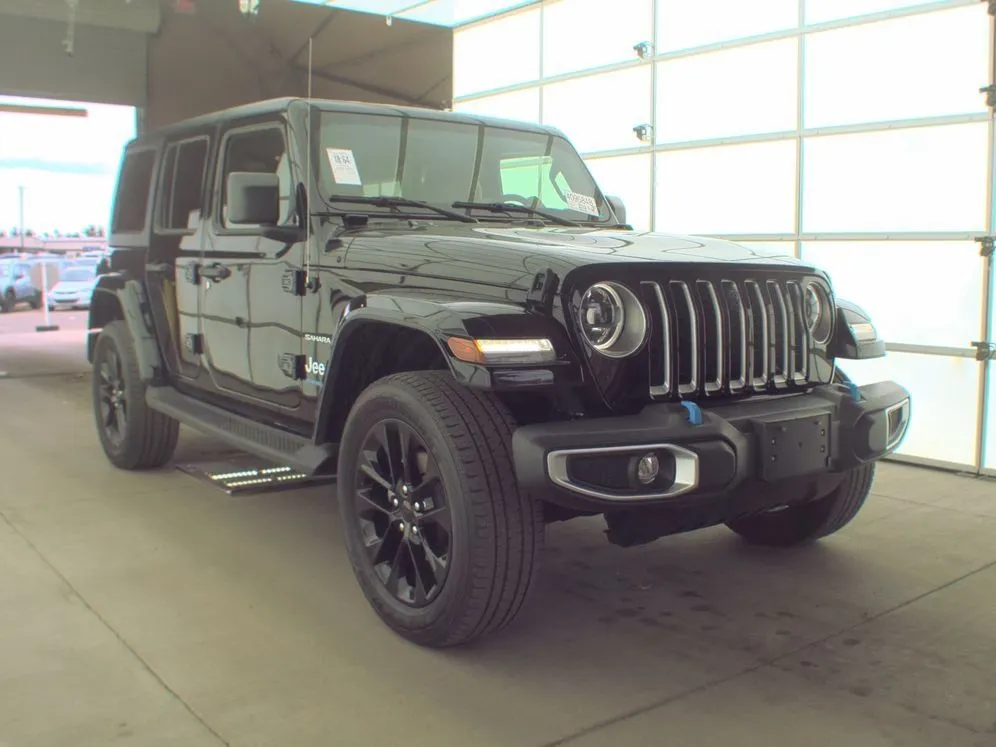 Black 2023 Jeep Wrangler Sahara 4xe for sale in Dunkirk, IN