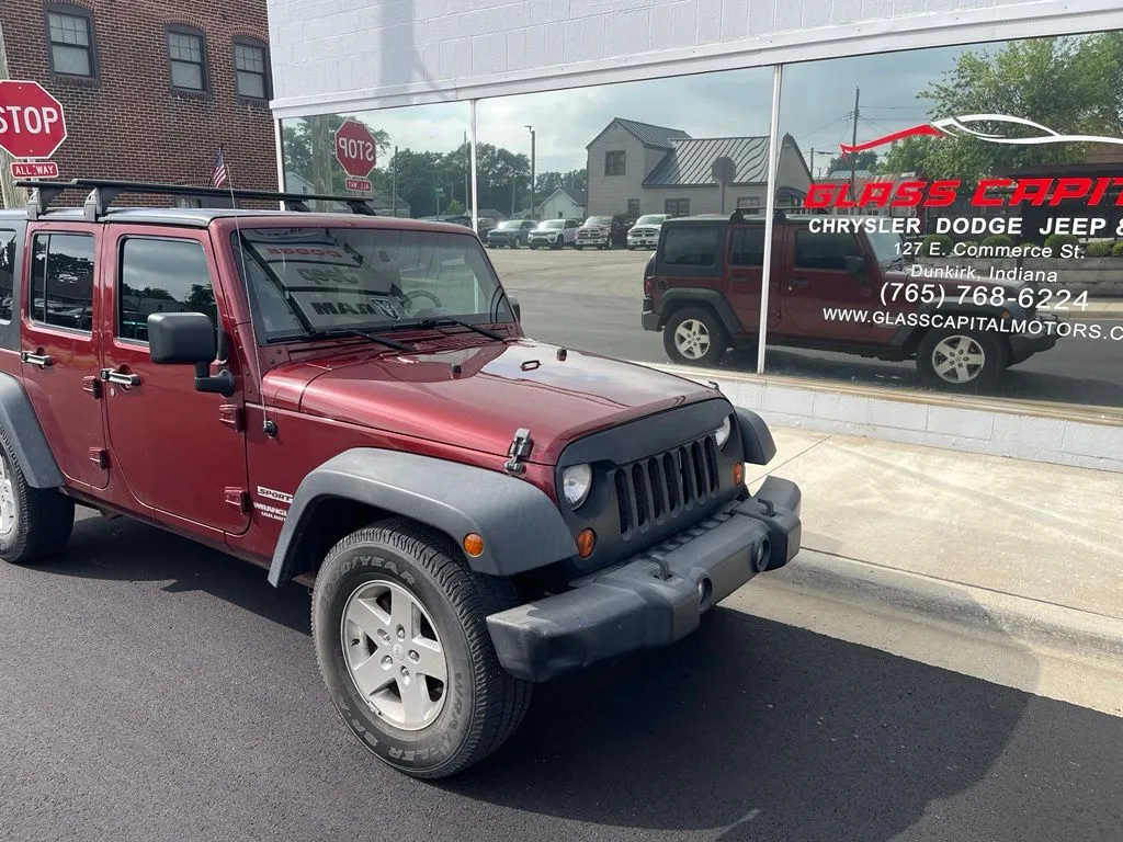 Red 2010 Jeep Wrangler Unlimited Sport for sale in Dunkirk, IN
