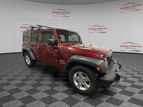 Red 2010 Jeep Wrangler Unlimited Sport for sale in Dunkirk, IN