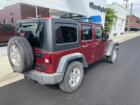 Another view of 2010 Jeep Wrangler Unlimited Sport for sale in Dunkirk, IN at Glass Capital CDJR