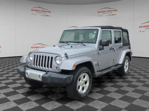 Another view of 2014 Jeep Wrangler Unlimited Sahara for sale in Dunkirk, IN at Glass Capital CDJR