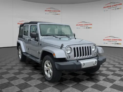 Silver 2014 Jeep Wrangler Unlimited Sahara for sale in Dunkirk, IN