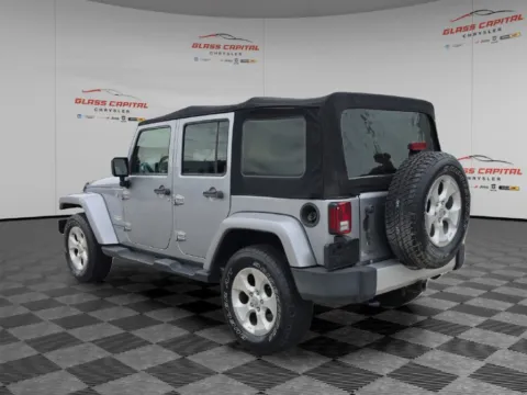 More photos of 2014 Jeep Wrangler Unlimited Sahara at Glass Capital CDJR, IN