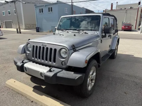 Silver 2014 Jeep Wrangler Unlimited Sahara for sale in Dunkirk, IN