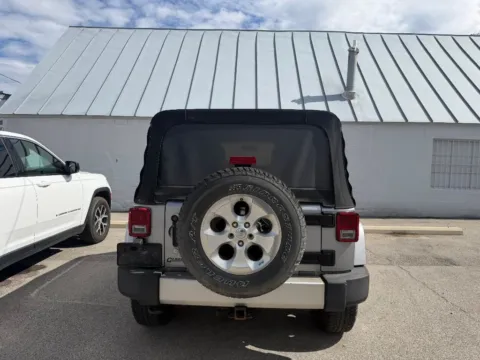 More photos of 2014 Jeep Wrangler Unlimited Sahara at Glass Capital CDJR, IN