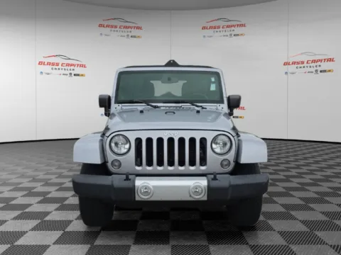Photos of 2014 Jeep Wrangler Unlimited Sahara for sale in Dunkirk, IN at Glass Capital CDJR