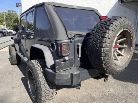 Another view of 2016 Jeep Wrangler Unlimited Sahara for sale in Charlotte, NC at Dream Work Automotive
