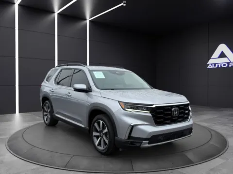 Another view of 2025 HONDA PILOT TOURING KBB VALUE 37K WOW for sale in Columbus, OH at Auto Palace