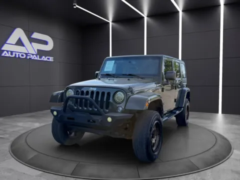 Green 2015 JEEP WRANGLER UNLIMI SAHARA for sale in Columbus, OH