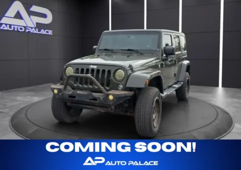 Green 2015 JEEP WRANGLER UNLIMI SAHARA for sale in Columbus, OH