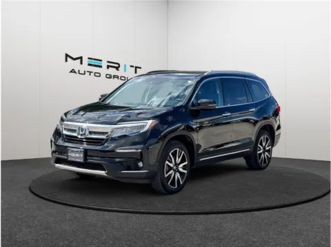 More photos of 2022 Honda Pilot Touring Sport Utility 4D at Merit Auto Group Lem Turner, FL