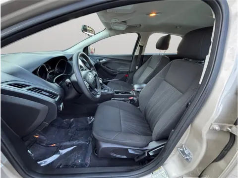 Photos of 2018 Ford Focus SE Hatchback 4D for sale in Jacksonville, FL at Merit Auto Group Lem Turner