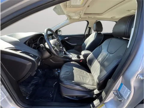 Photos of 2014 Ford Focus Titanium Hatchback 4D for sale in Jacksonville, FL at Merit Auto Group Lem Turner