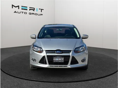 Another view of 2014 Ford Focus Titanium Hatchback 4D for sale in Jacksonville, FL at Merit Auto Group Lem Turner