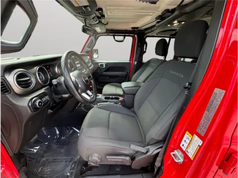 Photos of 2019 Jeep Wrangler Unlimited Sahara Sport Utility 4D for sale in Jacksonville, FL at Merit Auto Group Lem Turner