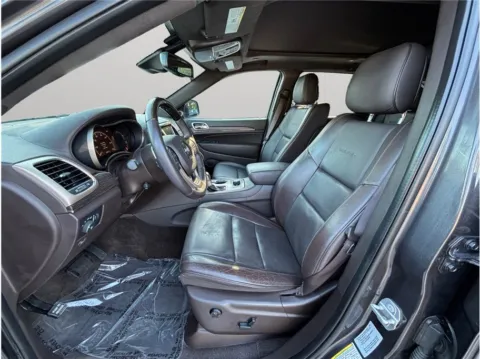 Photos of 2016 Jeep Grand Cherokee Summit Sport Utility 4D for sale in Jacksonville, FL at Merit Auto Group Lem Turner