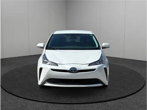 Another view of 2021 Toyota Prius L Eco Hatchback 4D for sale in Jacksonville, FL at Merit Auto Group Lem Turner