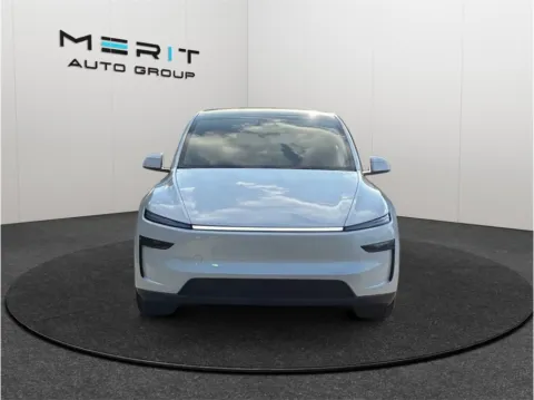Another view of 2026 Tesla Model Y Long Range Sport Utility 4D for sale in Jacksonville, FL at Merit Auto Group Lem Turner
