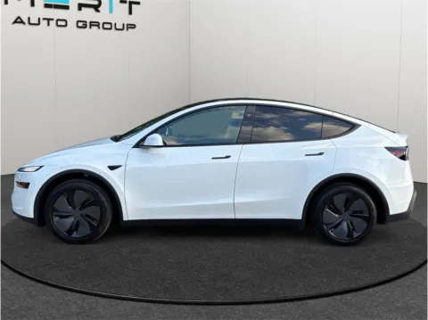 More photos of 2026 Tesla Model Y Long Range Sport Utility 4D at Merit Auto Group Lem Turner, FL