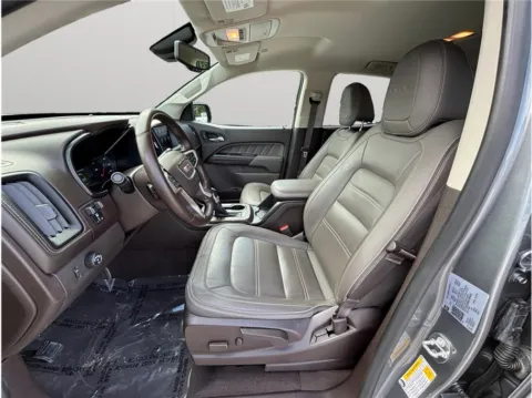 Photos of 2022 GMC Canyon Crew Cab Denali Pickup 4D 5 ft for sale in Jacksonville, FL at Merit Auto Group Lem Turner