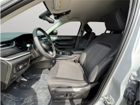 Photos of 2024 Jeep Grand Cherokee L Laredo Sport Utility 4D for sale in Jacksonville, FL at Merit Auto Group Lem Turner