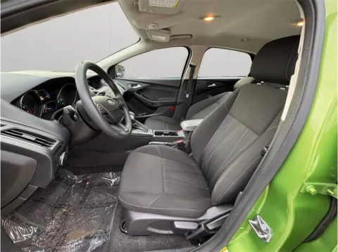 Photos of 2018 Ford Focus SE Hatchback 4D for sale in Jacksonville, FL at Merit Auto Group Lem Turner