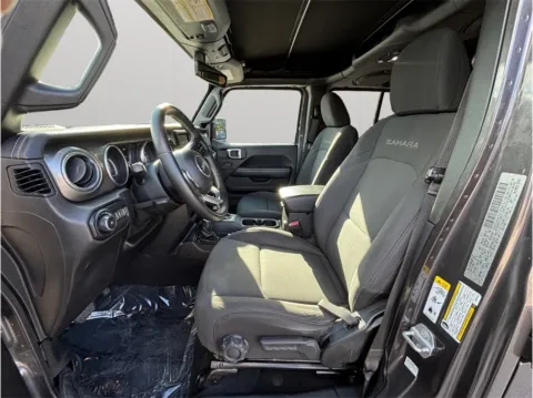 Photos of 2018 Jeep Wrangler Unlimited All New Sahara Sport Utility 4D for sale in Jacksonville, FL at Merit Auto Group Lem Turner