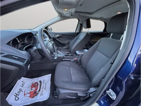 Photos of 2017 Ford Focus SEL Hatchback 4D for sale in Jacksonville, FL at Merit Auto Group Lem Turner