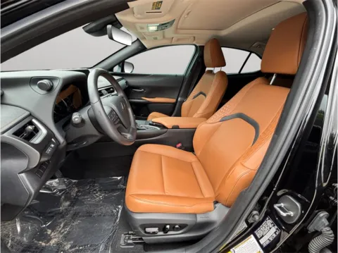 Photos of 2021 Lexus UX 250h Sport Utility 4D for sale in Jacksonville, FL at Merit Auto Group Lem Turner