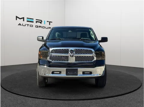 Another view of 2017 Ram 1500 Quad Cab SLT Pickup 4D 6 1/3 ft for sale in Jacksonville, FL at Merit Auto Group Lem Turner