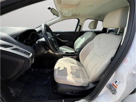 Photos of 2015 Ford Focus Titanium Sedan 4D for sale in Jacksonville, FL at Merit Auto Group Lem Turner