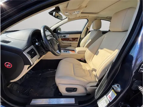 Photos of 2015 Jaguar XF Premium Sedan 4D for sale in Jacksonville, FL at Merit Auto Group Lem Turner