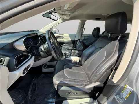 Photos of 2020 Chrysler Pacifica Touring L Minivan 4D for sale in Jacksonville, FL at Merit Auto Group Lem Turner