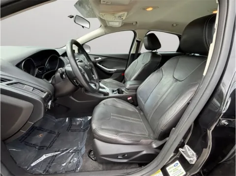 Photos of 2013 Ford Focus SE Hatchback 4D for sale in Jacksonville, FL at Merit Auto Group Lem Turner