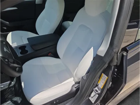 Photos of 2023 Tesla Model 3 Performance Sedan 4D for sale in Jacksonville, FL at Merit Auto Group Lem Turner
