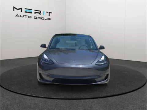 Another view of 2023 Tesla Model 3 Performance Sedan 4D for sale in Jacksonville, FL at Merit Auto Group Lem Turner